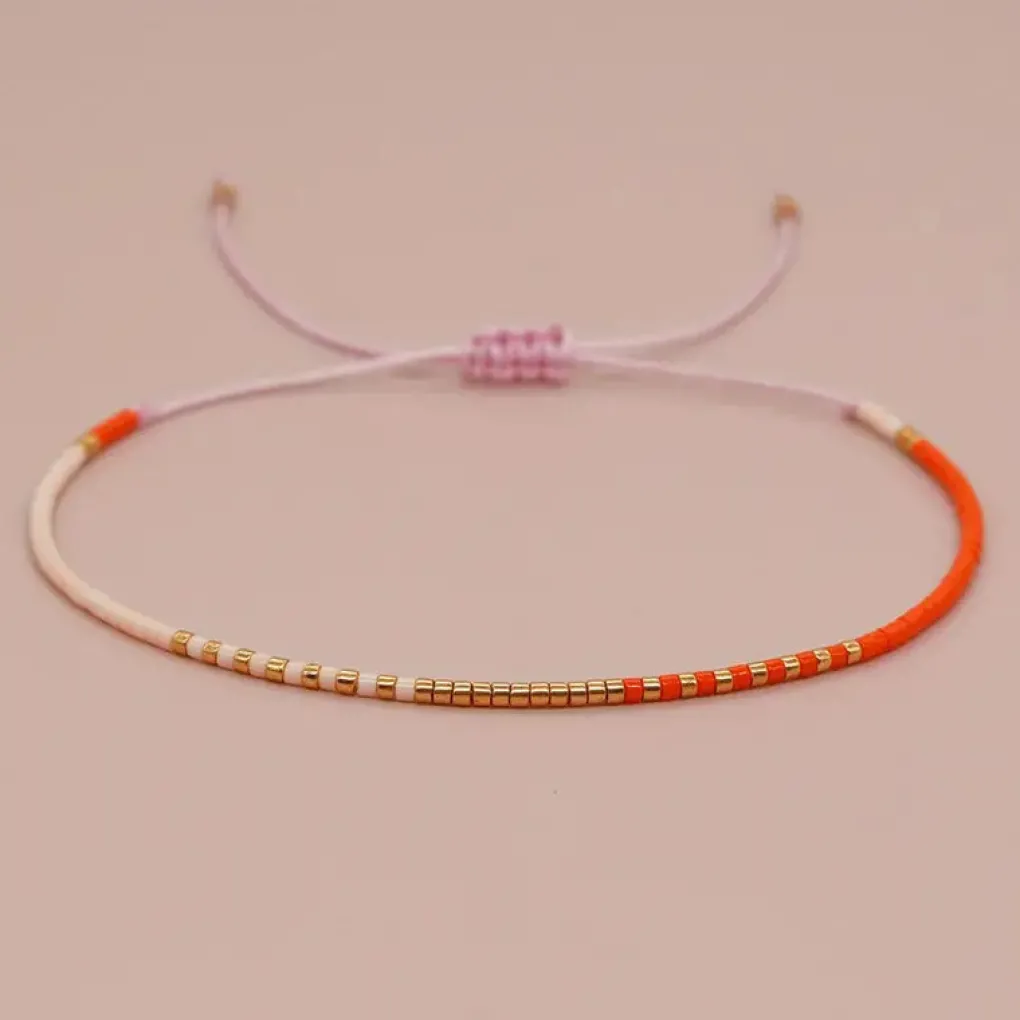 perlenarmband_im_boho_sti_1.webp noord® Perlenarmband im Boho Stil orange, rosé, gold